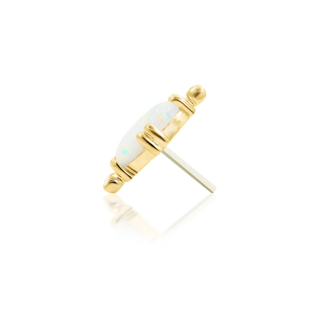 Solid yellow gold helix earring featuring an elongated white opal and sculptural gold flourish