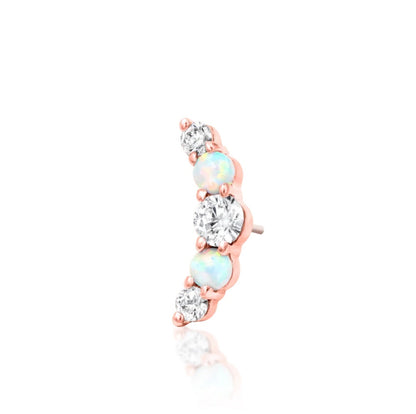 Rose gold cartilage stud featuring a curved white synthetic opal and cubic zirconia cluster