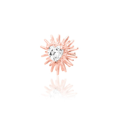 Rose gold cartilage stud with a heart gemstone protected by sculpted gold spikes