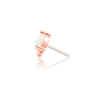 Rose gold conch earring with a petite pear-shaped opal gemstone