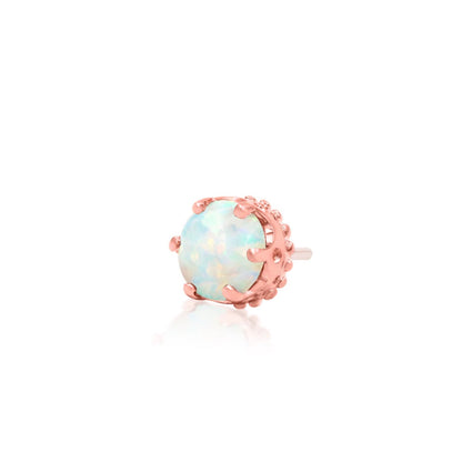 Petite rose gold tragus earring featuring a luminous synthetic opal