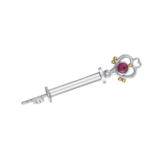 BVLA Pluto white gold nipple barbell with an 8mm ruby heart end, yellow gold accents and sculpted key end