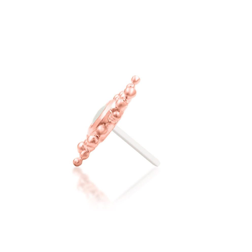 Side profile of Junipurr Ruth showing the raised rose gold moonstone setting