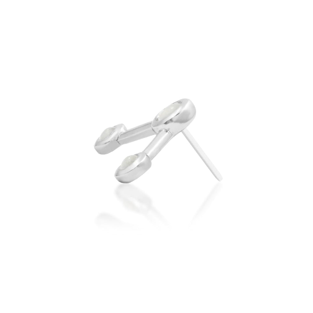 Side view of the fixed white gold framework and raised moonstone settings on Junipurr Asteria