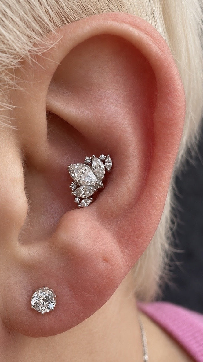 Curated white gold ear featuring Queen Naveen and a 4mm Crown Prong gem