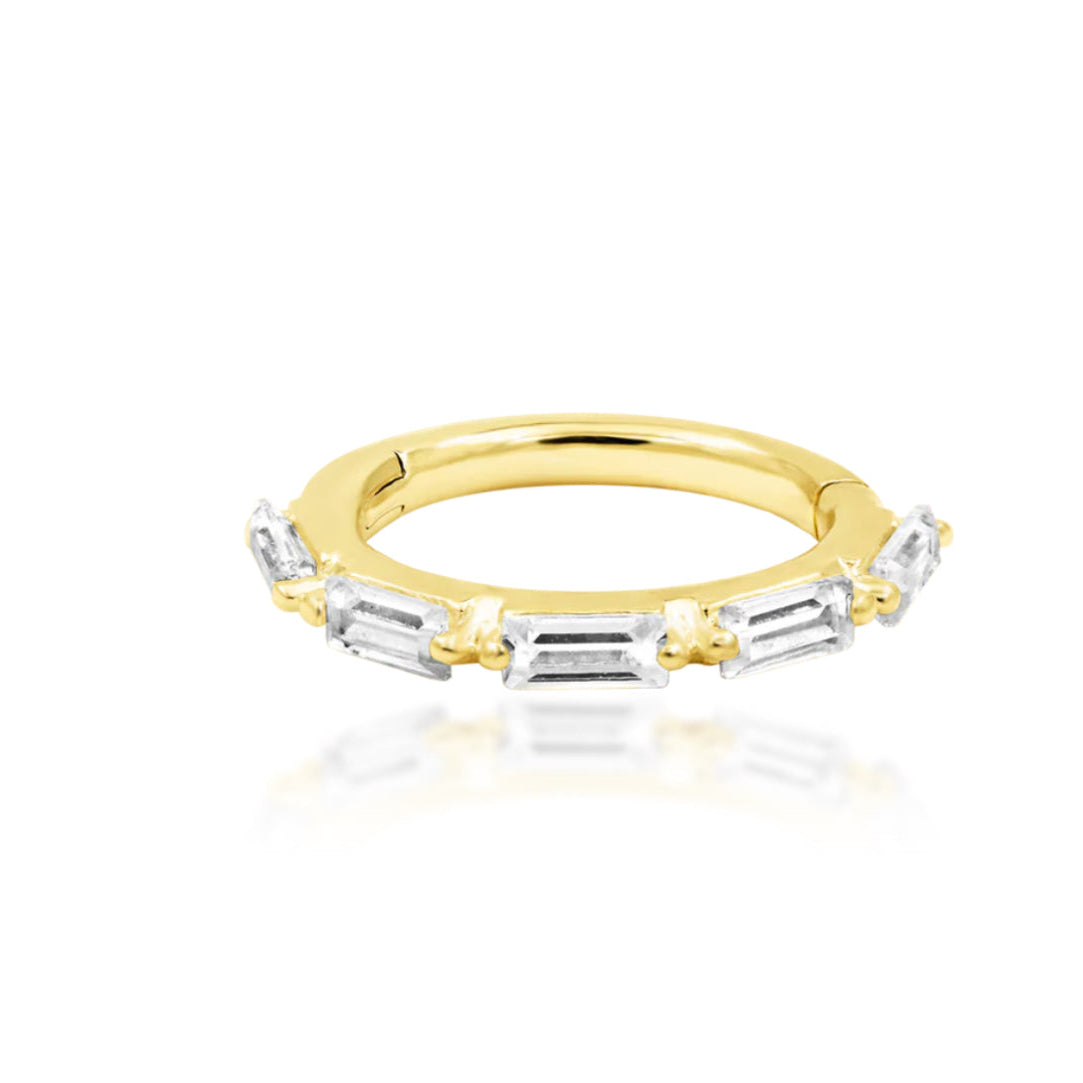Solid gold baguette helix ring in 14k yellow gold, featuring the five forward-facing cubic zirconia stones of Junipurr Annie.