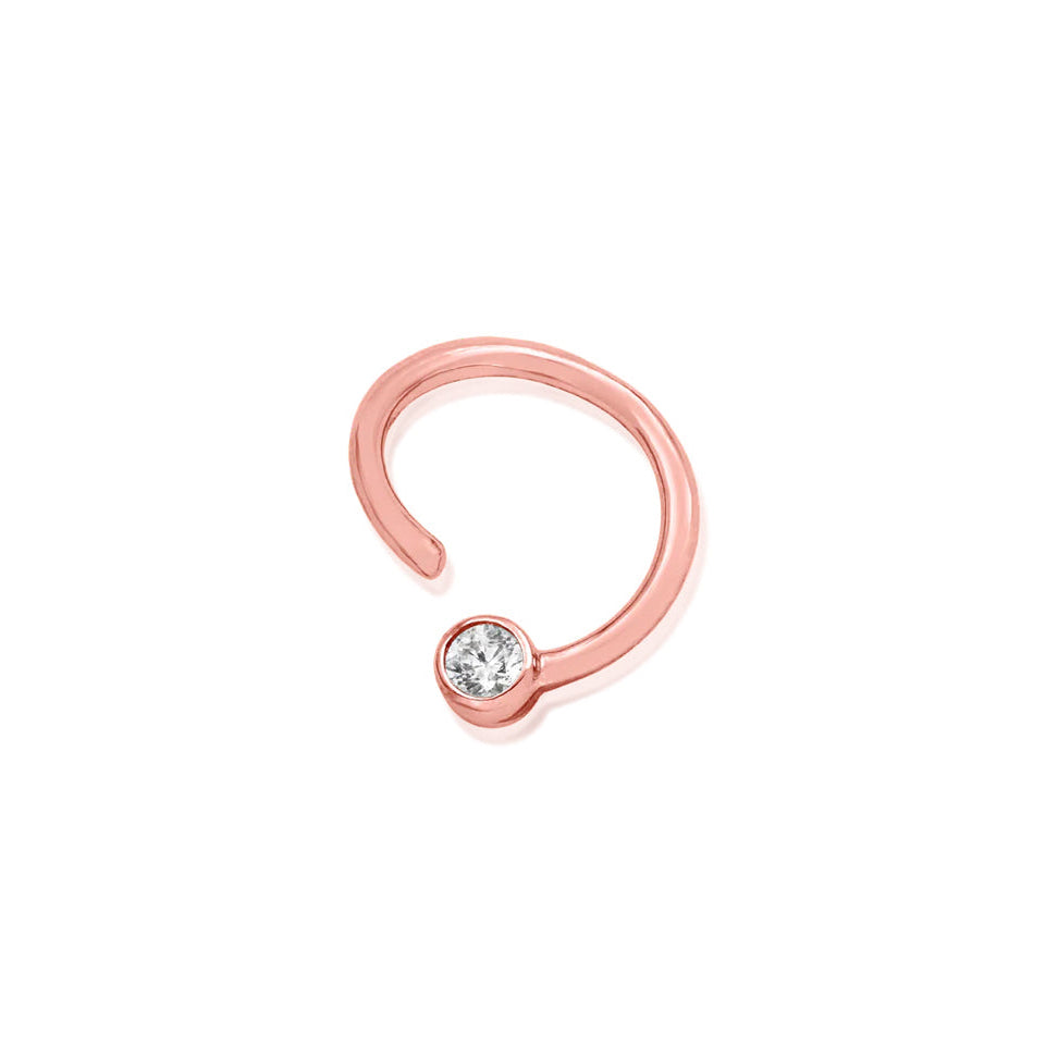 Solid gold cartilage ring in rose gold with a permanently fixed 3mm cubic zirconia.