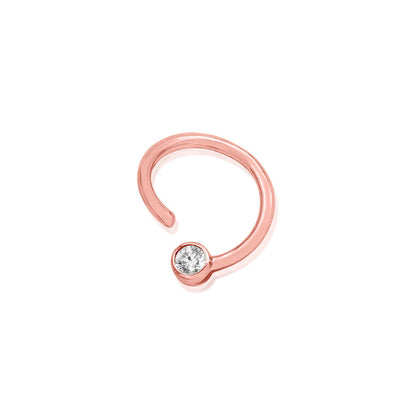 Solid gold cartilage ring in rose gold with a permanently fixed 3mm cubic zirconia.