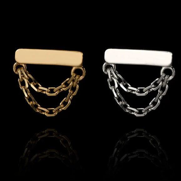 Solid gold chain cartilage earring in 14k yellow gold with a polished bar and delicate double chain.