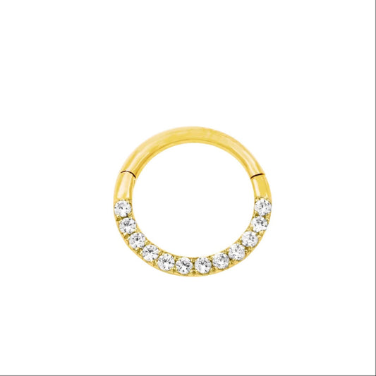 Solid gold CZ daith ring in 14k yellow gold, featuring the continuous clear cubic zirconia setting of Junipurr Halo.