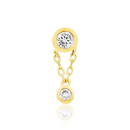 Solid gold CZ dangle earring in 14k yellow gold with two bezel-set clear gemstones and a fine chain.