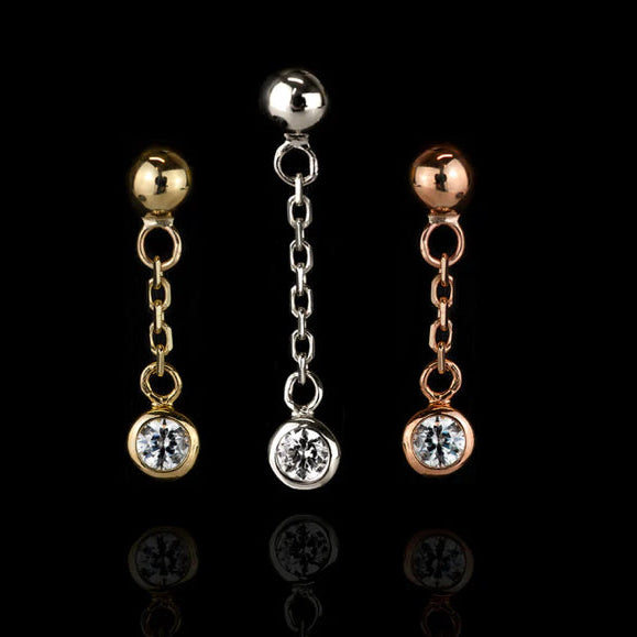 Solid gold CZ dangle earring in 14k yellow gold with a polished ball, fine chain and clear gemstone drop.