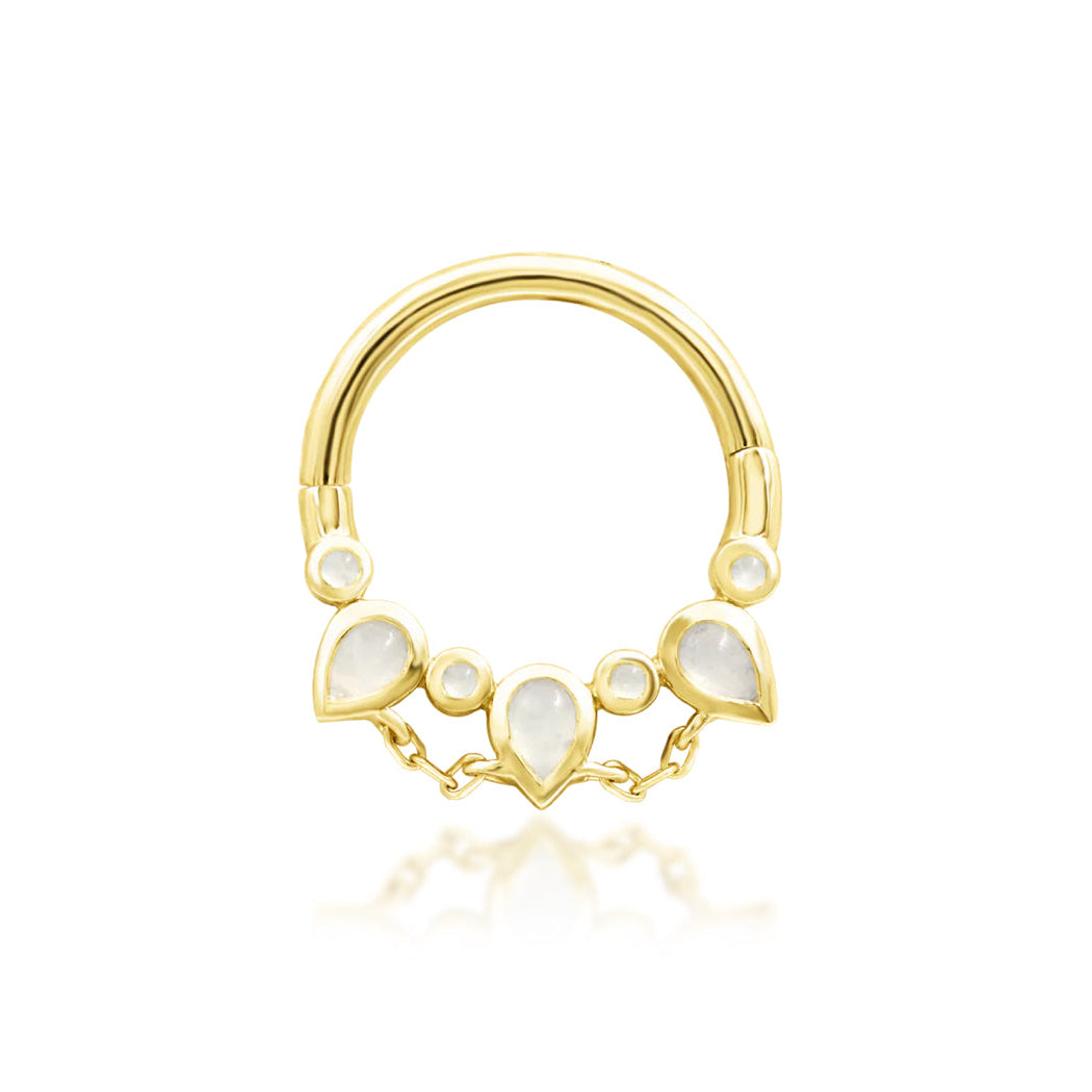 Solid gold moonstone daith ring in 14k yellow gold featuring Junipurr Catalina with pear-cut moonstones.