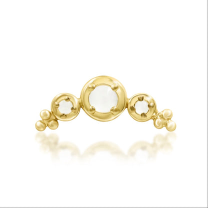 Solid gold moonstone helix earring in 14k yellow gold, featuring Junipurr Envee’s curved three-stone design.