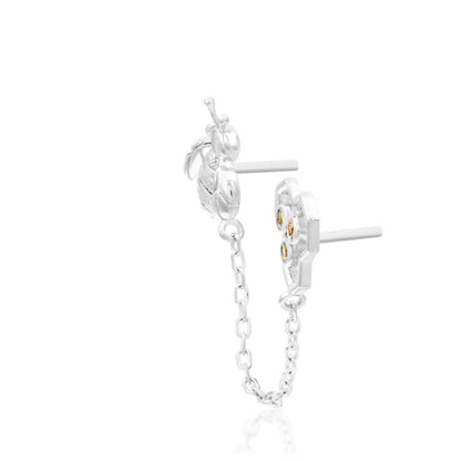 Solid white gold piercing jewellery with a bee, honeycomb and connecting chain