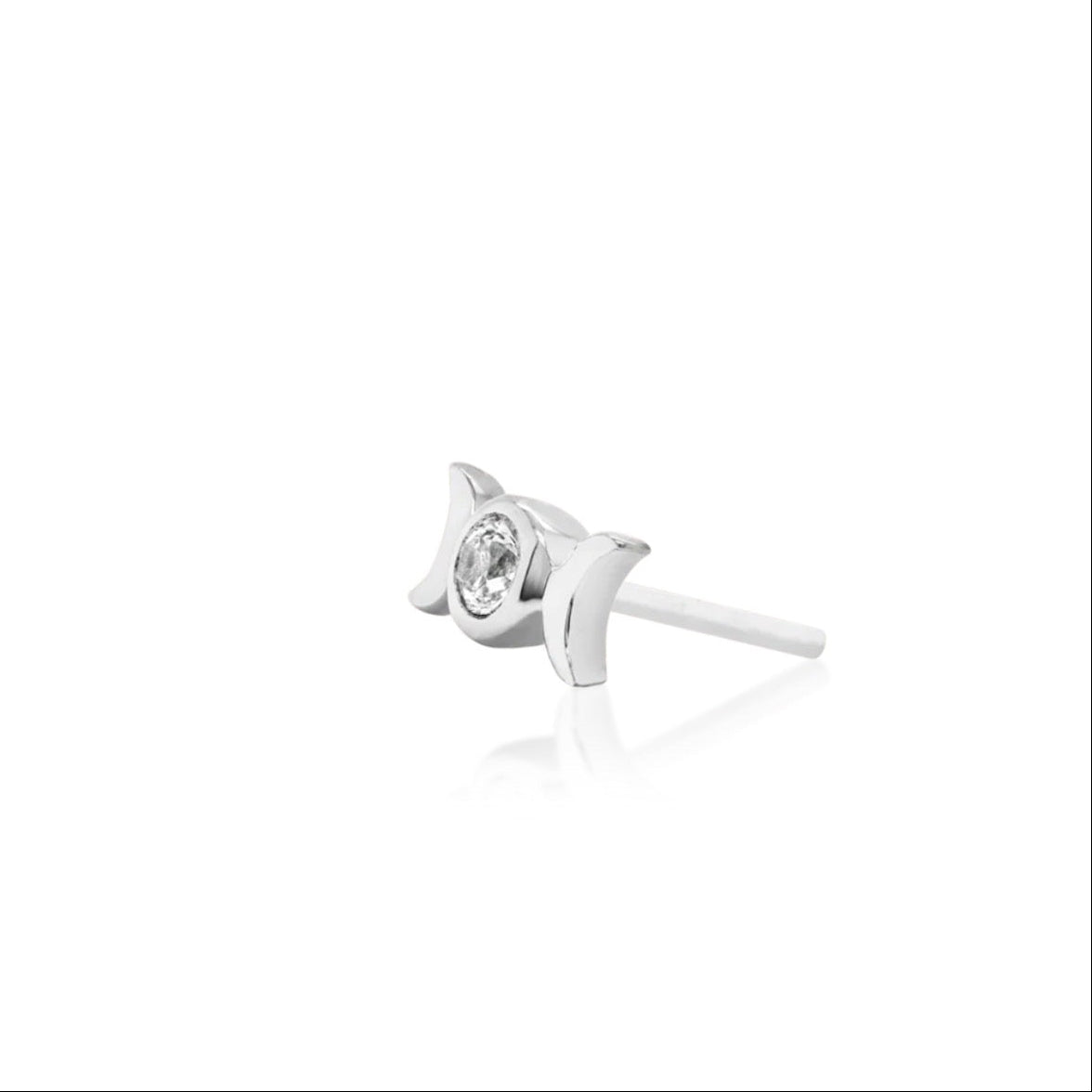 Solid white gold piercing jewellery with a symmetrical celestial design