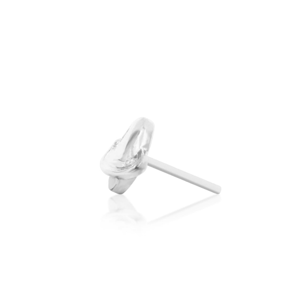 Solid white gold piercing jewellery featuring a sculpted ringed planet motif