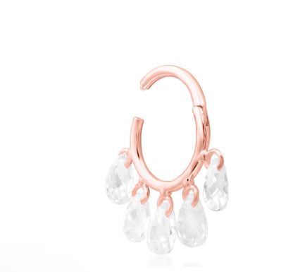 Sparkly solid gold ring in rose gold with five marquise-cut white cubic zirconia.