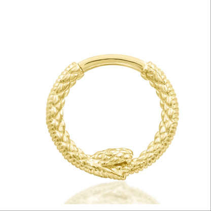 Solid gold snake daith ring in 14k yellow gold, featuring the detailed Junipurr Ouroboros serpent.