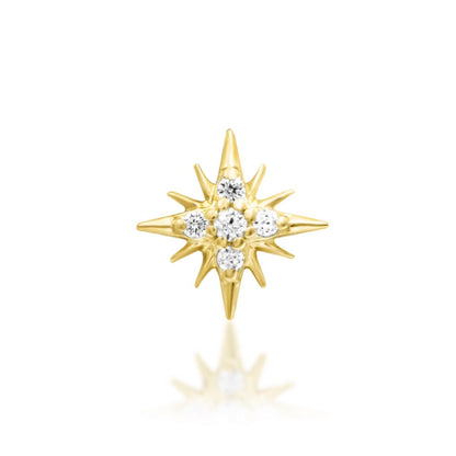 Starburst cartilage earring in solid 14k yellow gold with a central cluster of clear cubic zirconia.