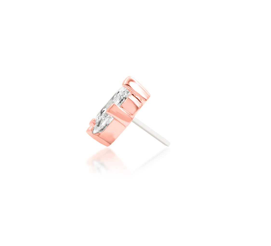 Statement rose gold conch stud with three prong-set marquise white CZ gemstones
