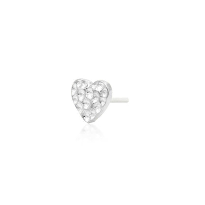 Textured white gold tragus earring featuring a petite hammered heart design
