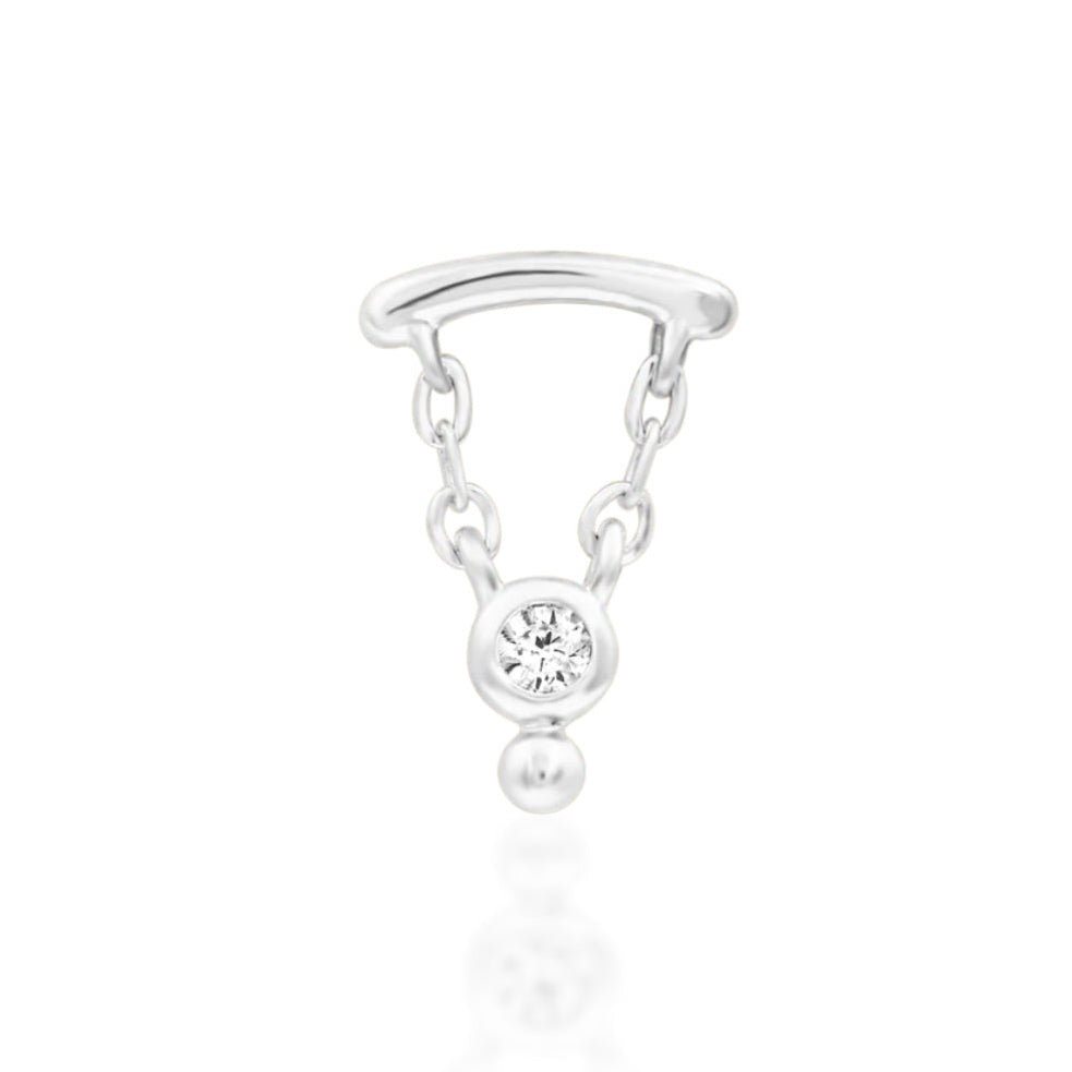 Threadless cartilage earring in 14k white gold with an elongated shape and moving gemstone accent.