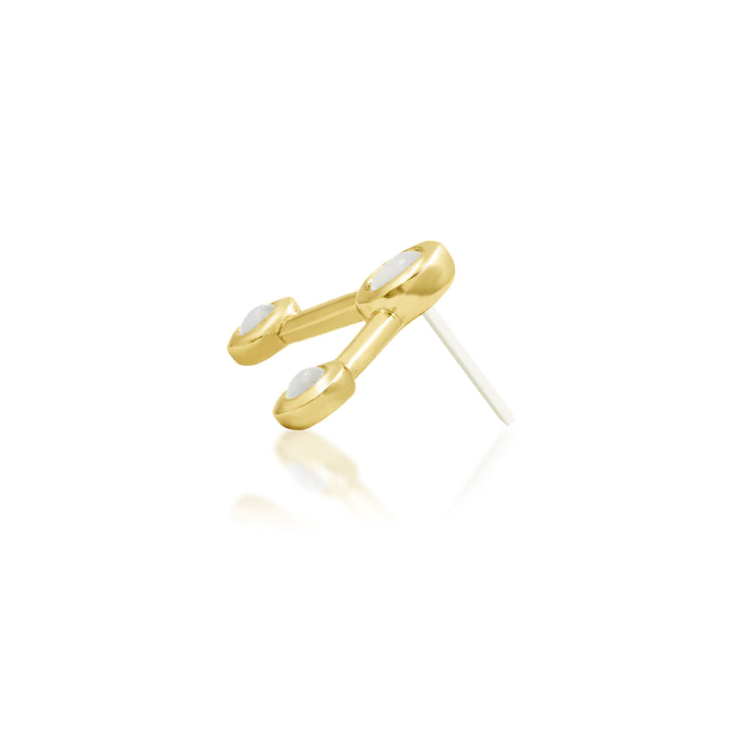 Side profile of Junipurr Asteria showing its delicate yellow gold structure and raised moonstones

