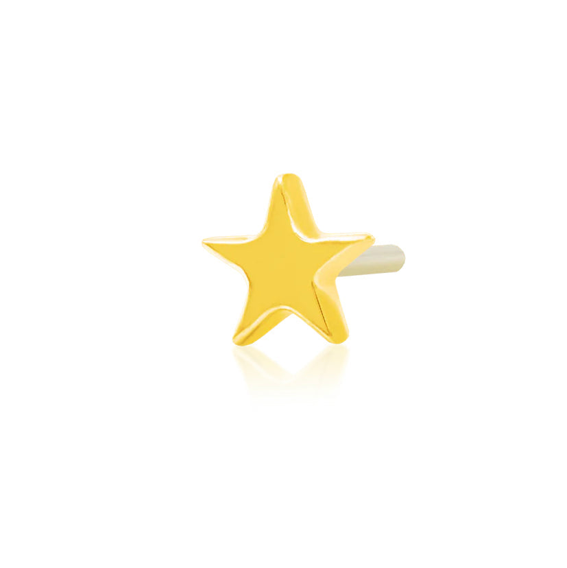 Tiny gold star earring in solid 14k yellow gold measuring approximately 3mm.