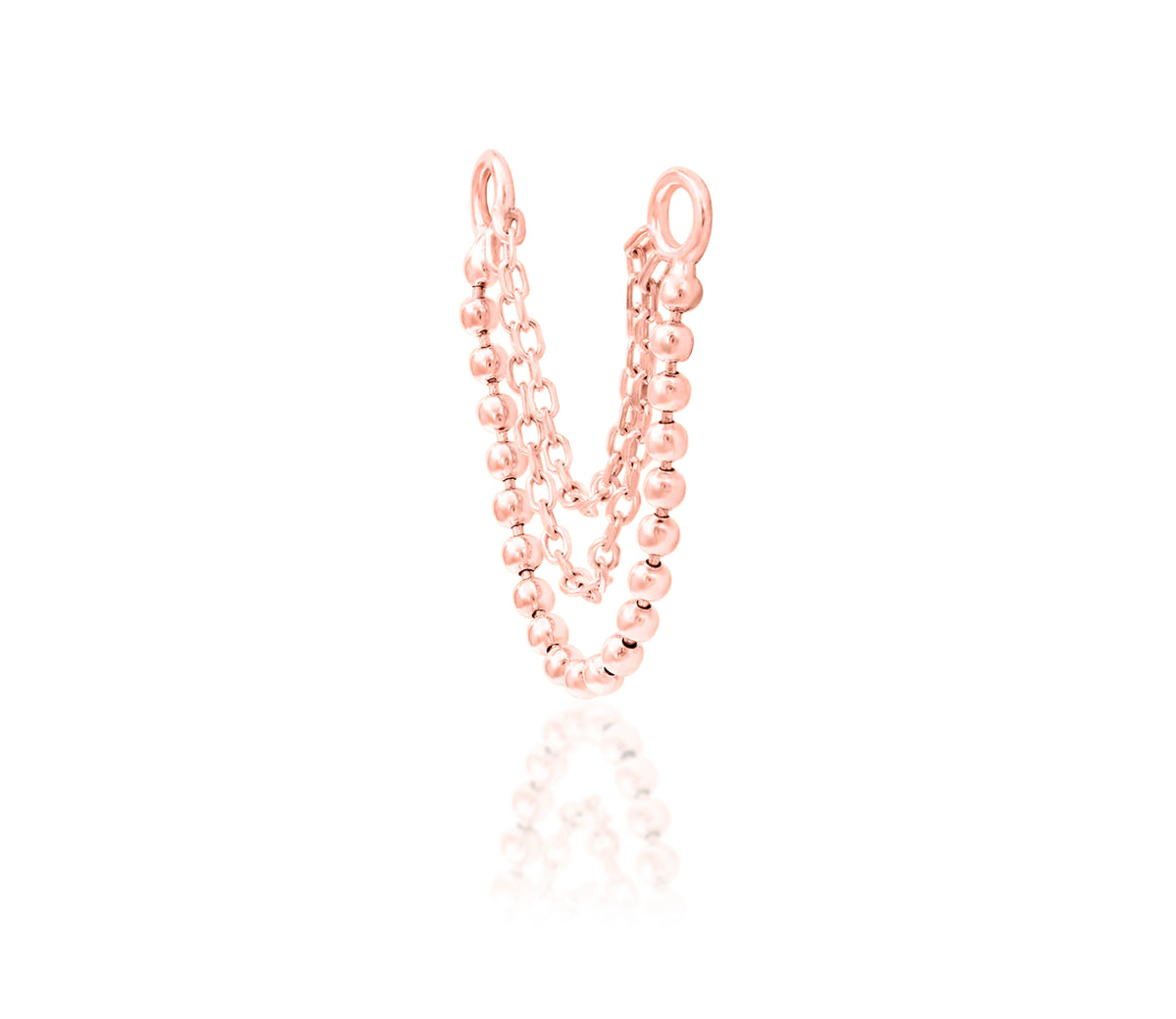 Angled view of solid 14k rose gold Junipurr Quinn showing the fluid three-chain construction.