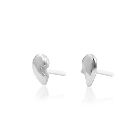 Two-piece heart cartilage jewellery in solid 14k white gold with polished connecting edges.
