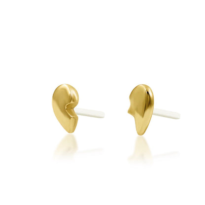 Two-piece heart lobe earrings in polished yellow gold with divided edges that align as a unified design.