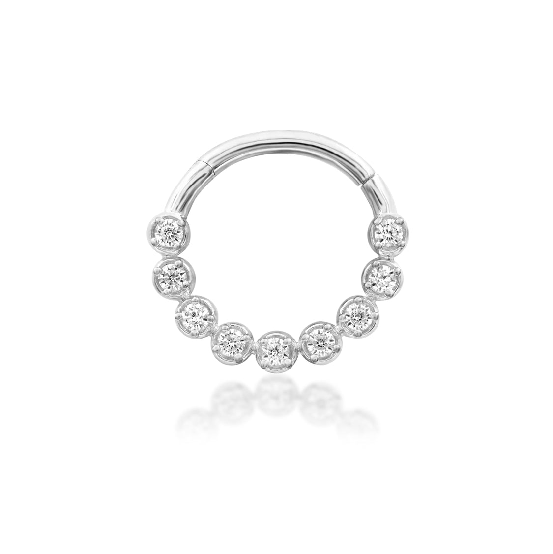 White CZ septum ring in 14k white gold featuring the graduated gemstone arrangement of Junipurr Aziza.