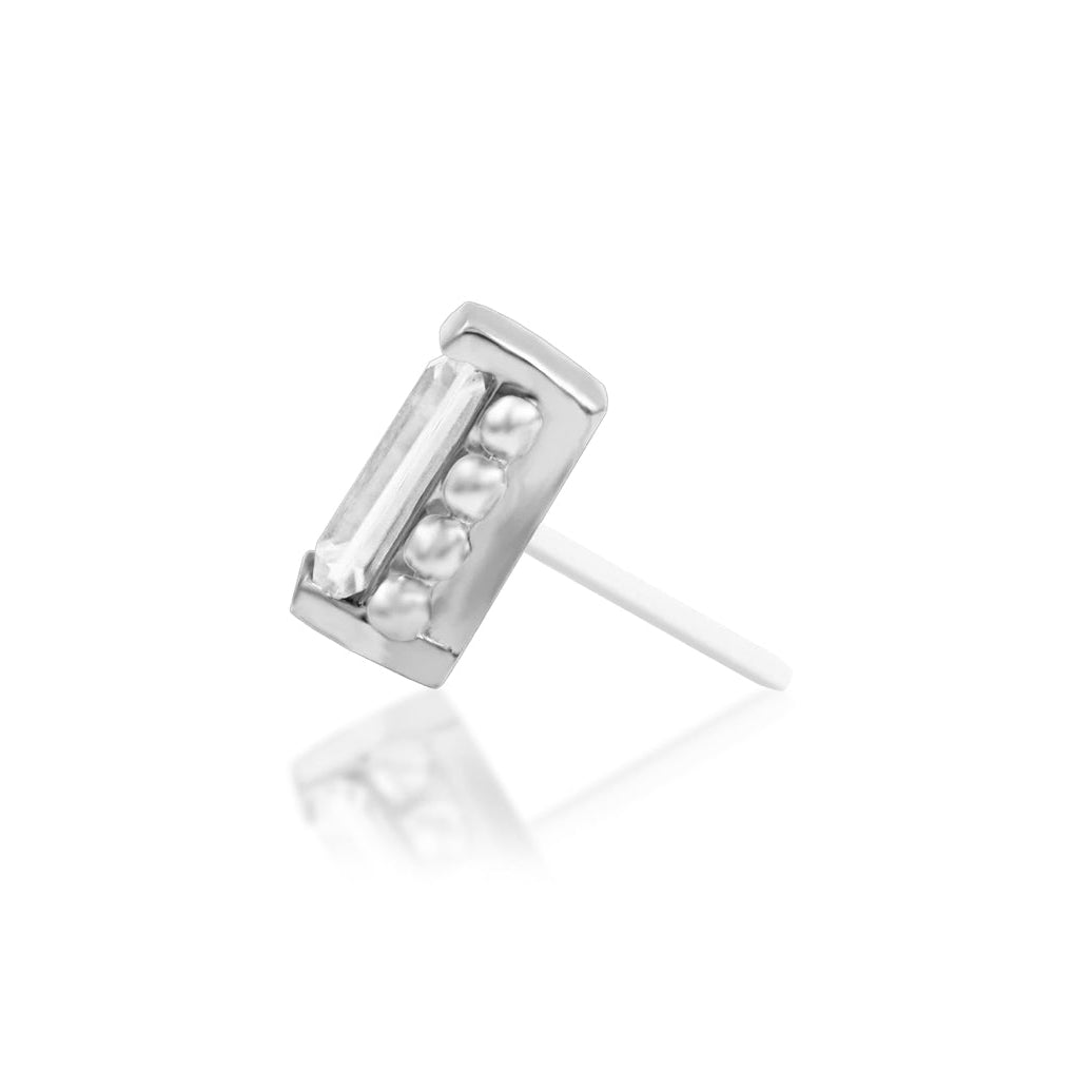     White gold piercing stud featuring a baguette white CZ and beaded border