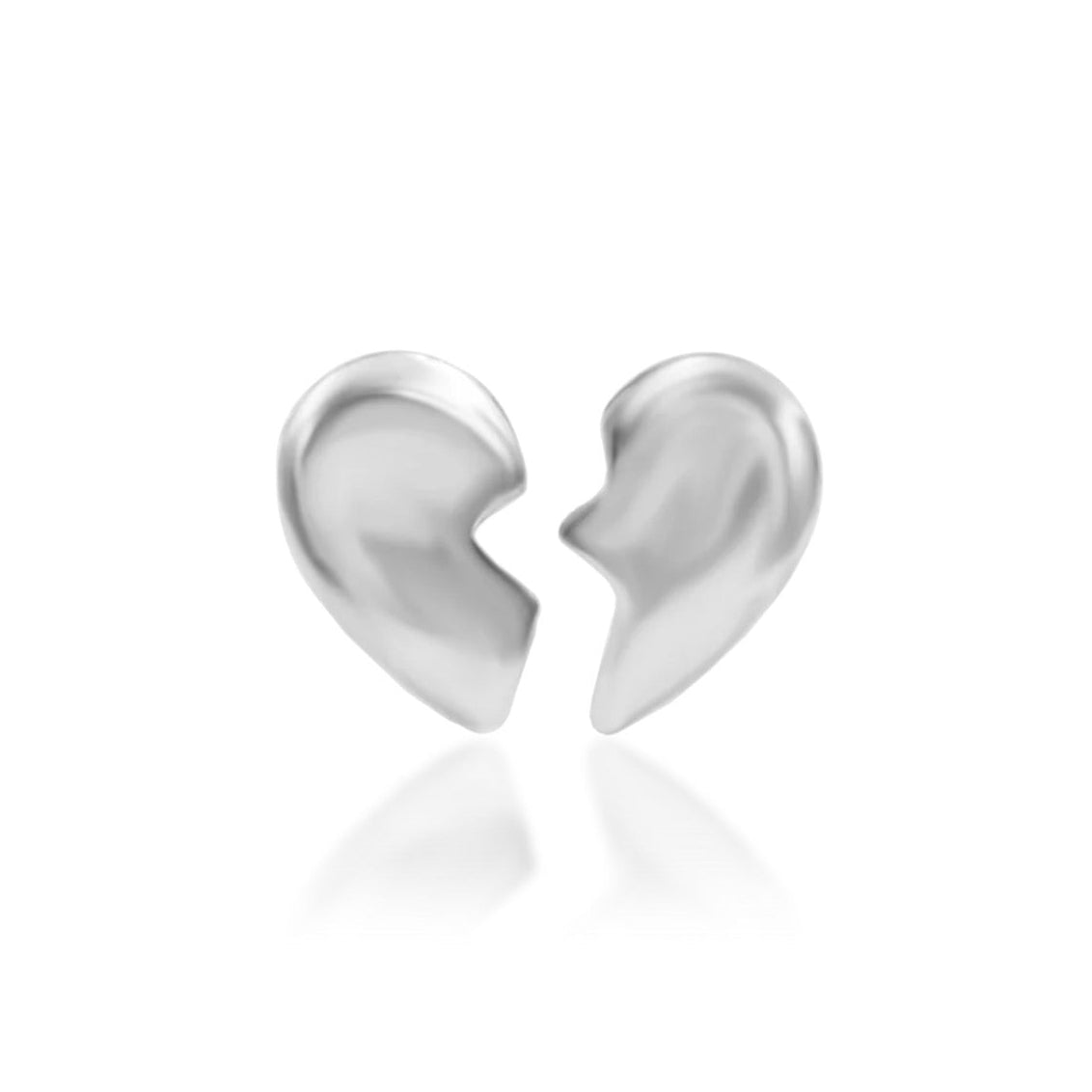 White gold broken-heart piercing earrings designed as two matching halves of one complete heart.