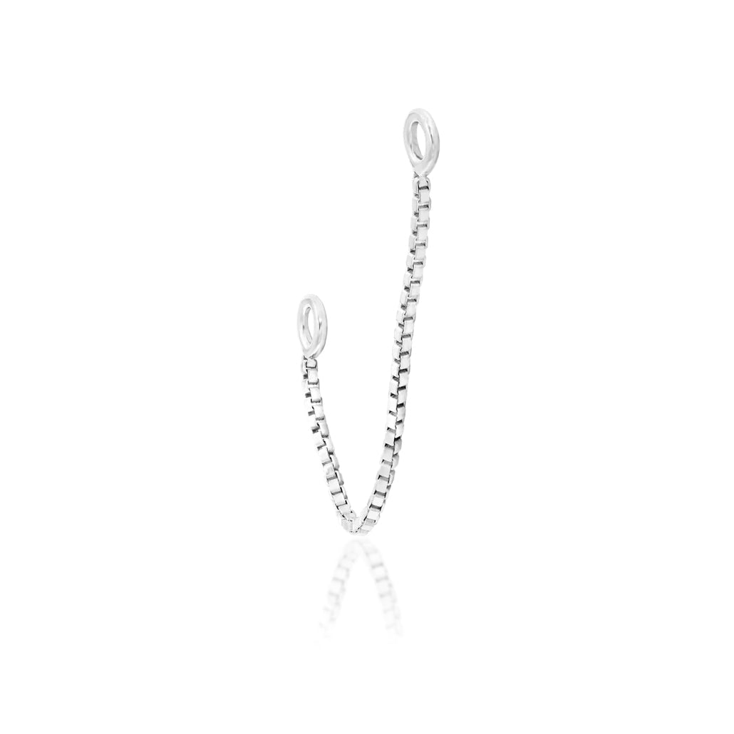     White gold cartilage connector chain designed to link two compatible piercings