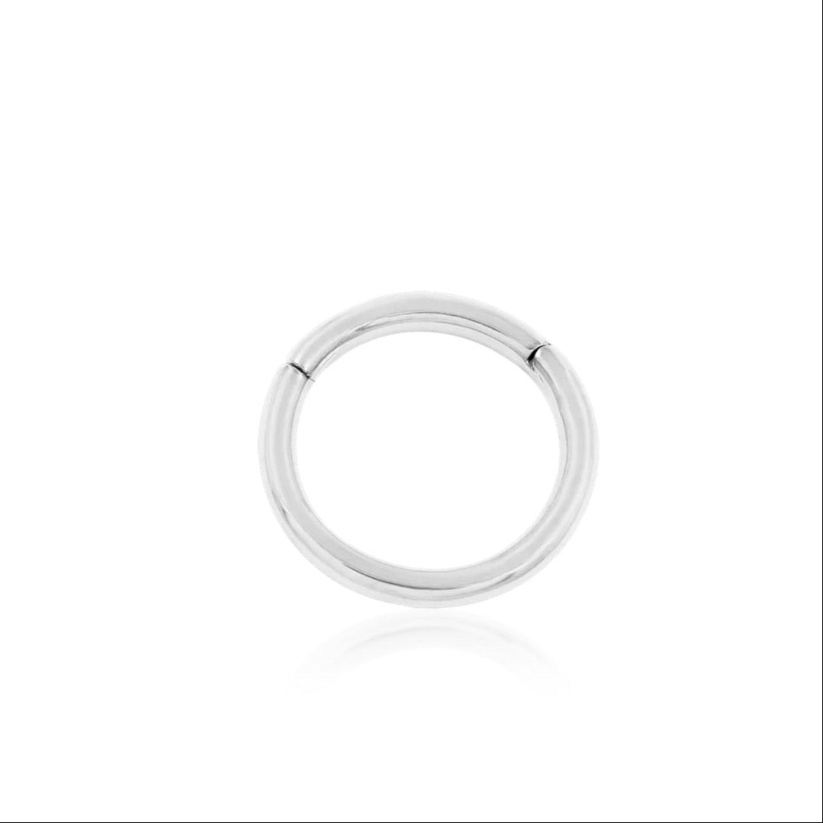 Solid white gold clicker ring with a polished seamless finish.