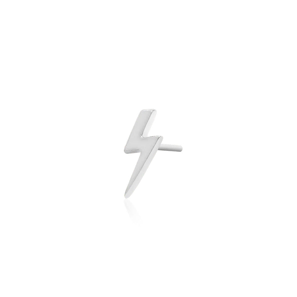 White gold conch earring with a directional solid gold lightning bolt design
