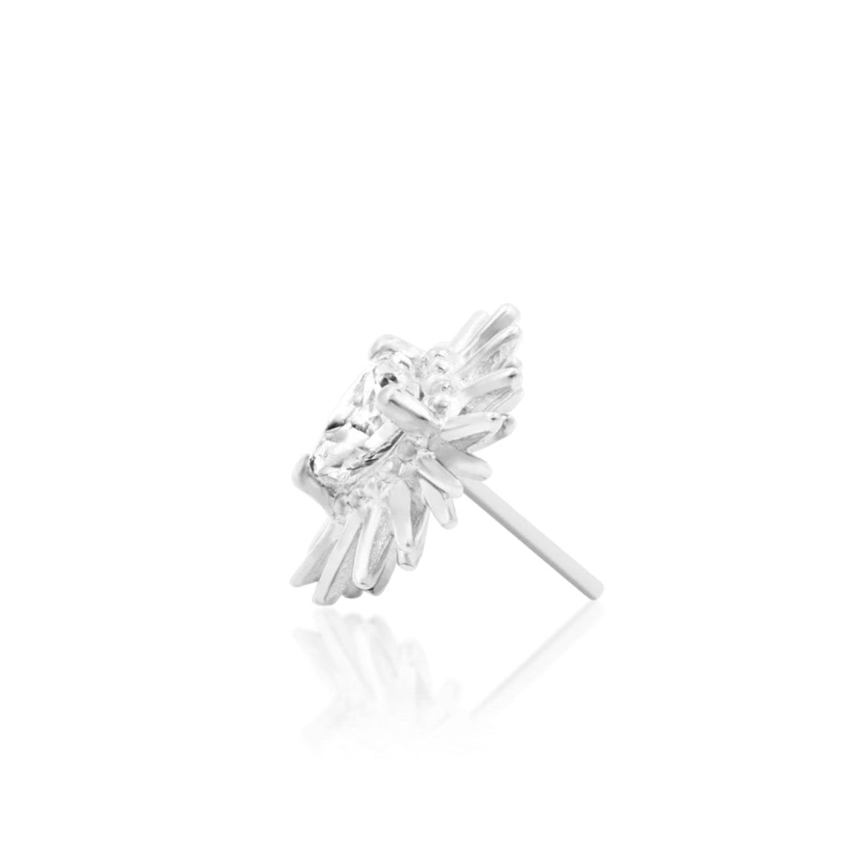 White gold conch jewellery featuring a central heart CZ within a sculptural setting