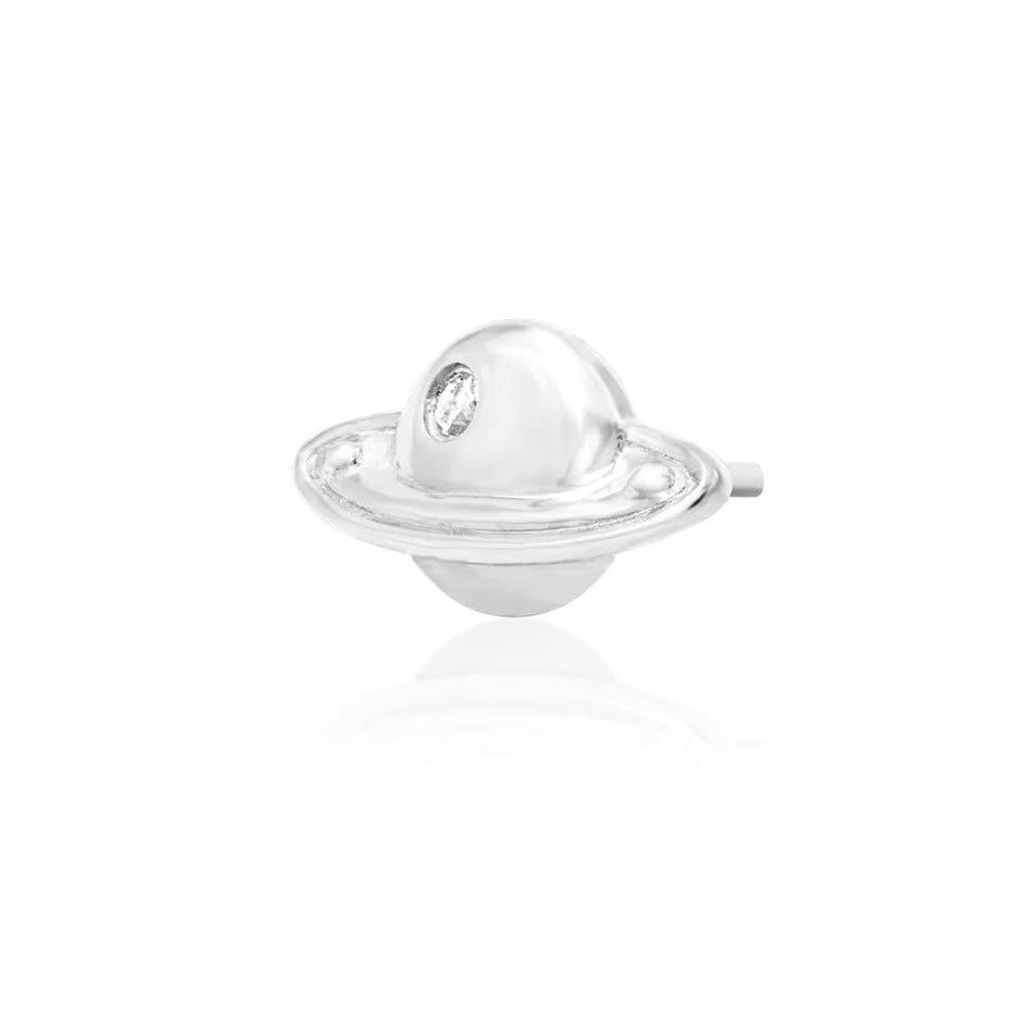 White gold conch jewellery shaped like Saturn with a glistening cubic zirconia