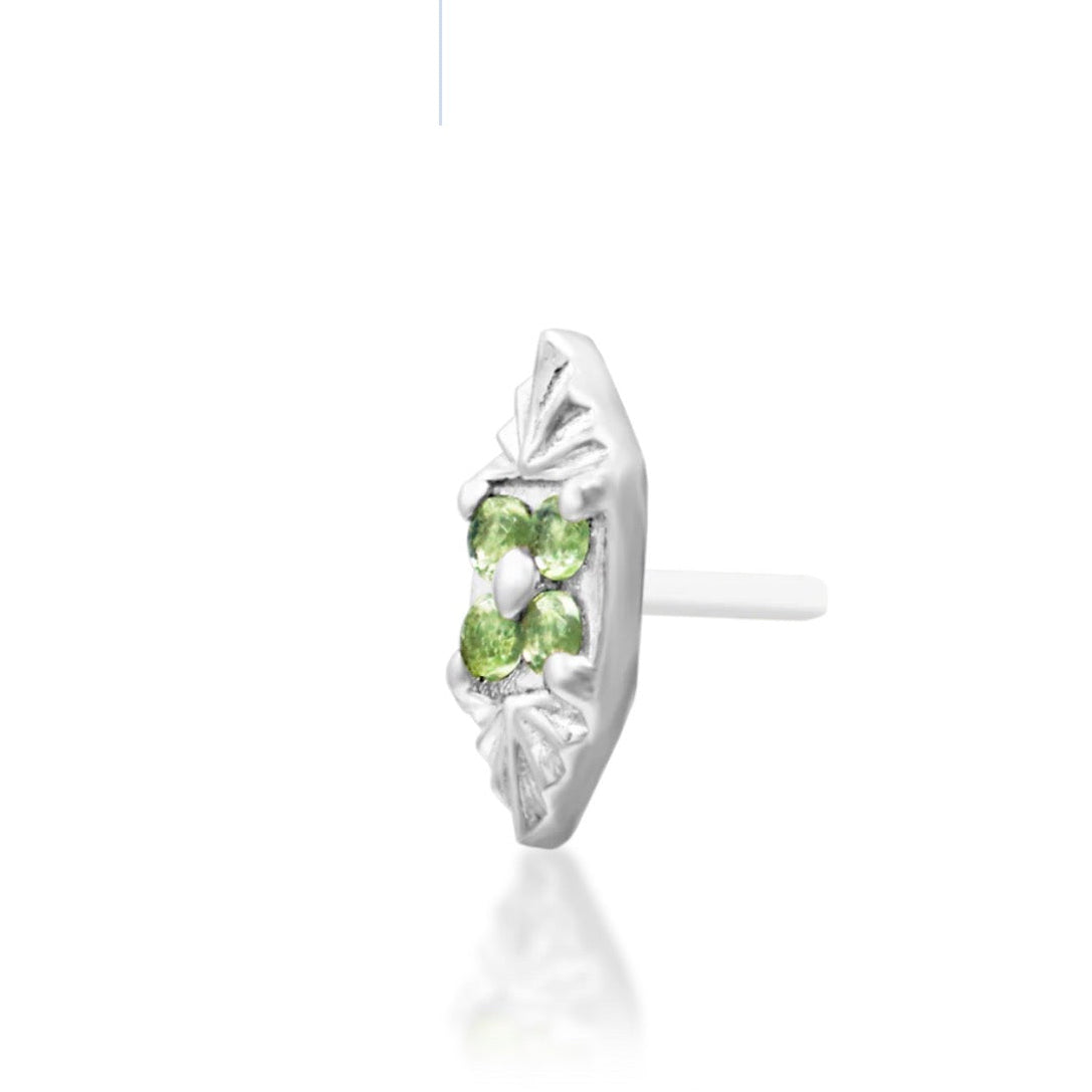  White gold conch jewellery with a geometric floral arrangement of green and white CZ stones