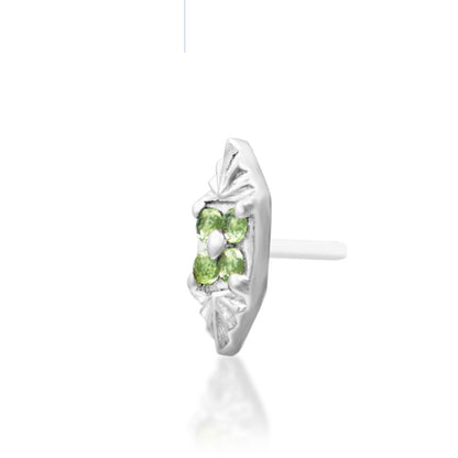  White gold conch jewellery with a geometric floral arrangement of green and white CZ stones