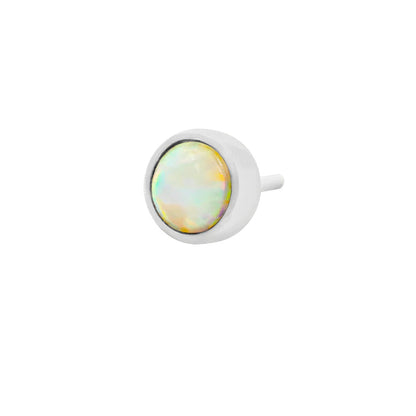 Petite white gold forward-helix stud featuring a round synthetic opal