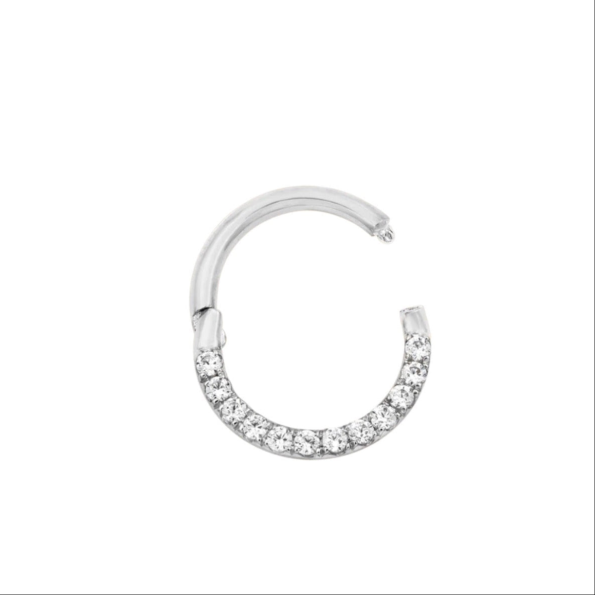 Solid gold cartilage hoop in white gold, shown in the sleek gemstone-set Junipurr Halo design.