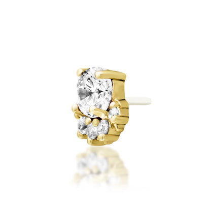 Yellow gold cartilage earring featuring a brilliant white cubic zirconia surrounded by five smaller stones