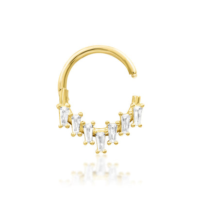 Geometric septum ring in yellow gold, with Junipurr Corus forming a precise fan of elongated white CZ stones.
