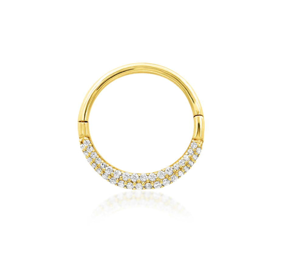 Off-front angled view of the Junipurr Jewellery Opulence ring in yellow gold, highlighting CZ sparkle and hinged design.