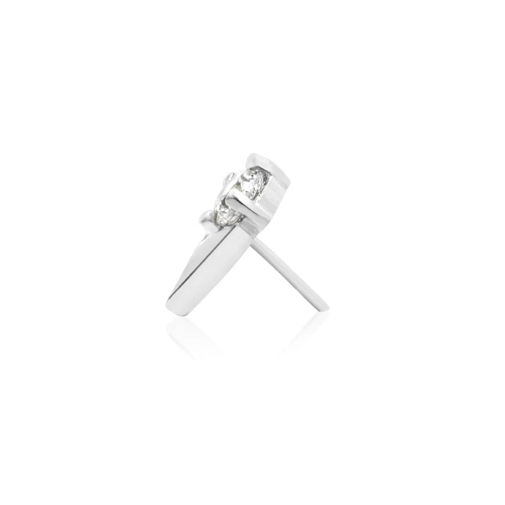 Botanical white gold helix stud featuring sculpted tulip petals and bright white CZ