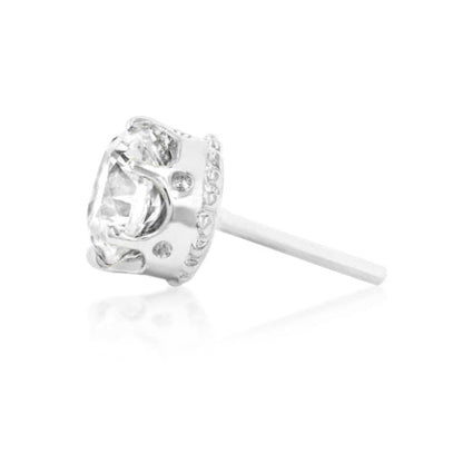 White gold flat piercing stud featuring a brilliant crown-set white CZ