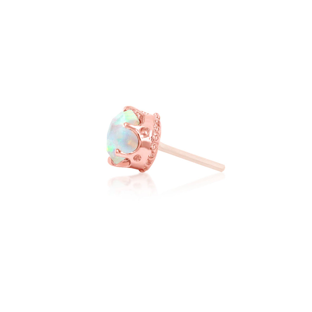 Solid rose gold cartilage stud with a colourful crown-set opal